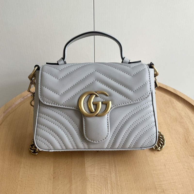 G*u*i top handle bags